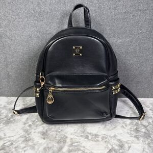 Black Backpack with Gold Zipper Accents, Adjustable Straps & Outer Pockets